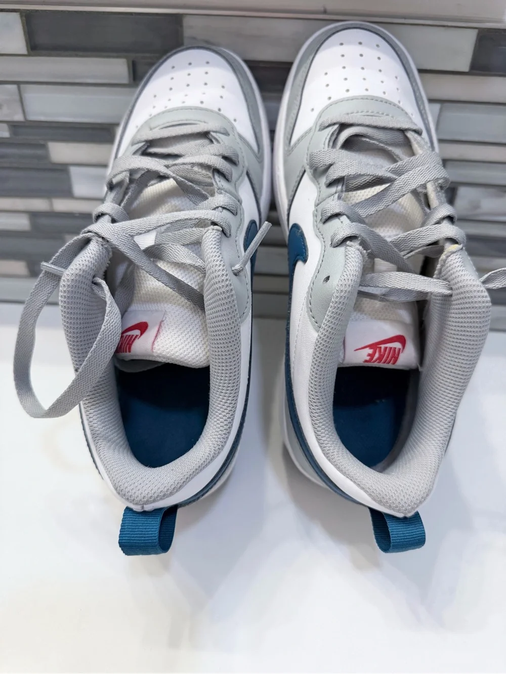 Nike Low-Top Sneakers in White, Gray, and Navy